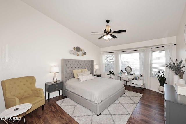 bedroom featuring ceiling fan, vaulted ceiling, and dark hardwood / wood-style flooring