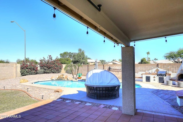 exterior space featuring area for grilling and a patio