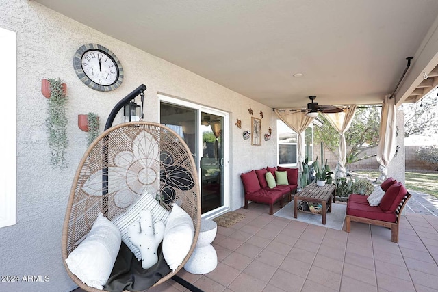 view of patio / terrace featuring ceiling fan