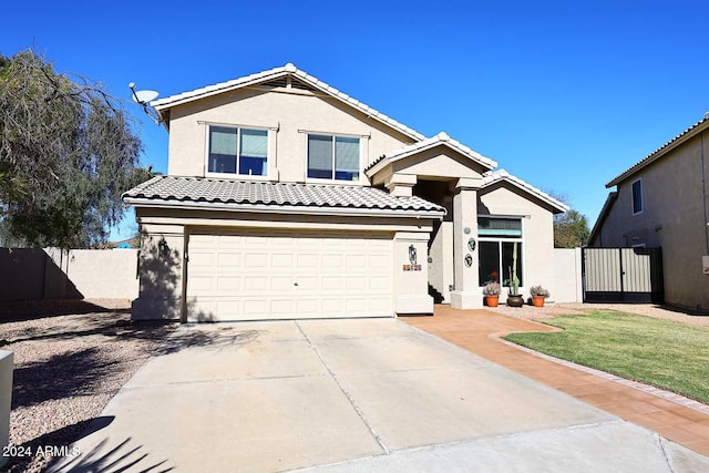 view of front of property featuring a garage