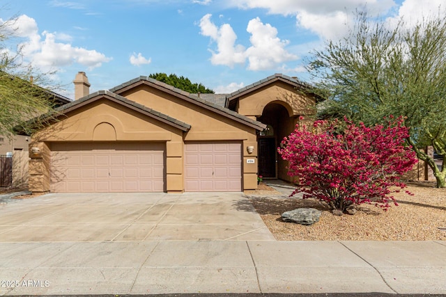 view of front of home with a garage