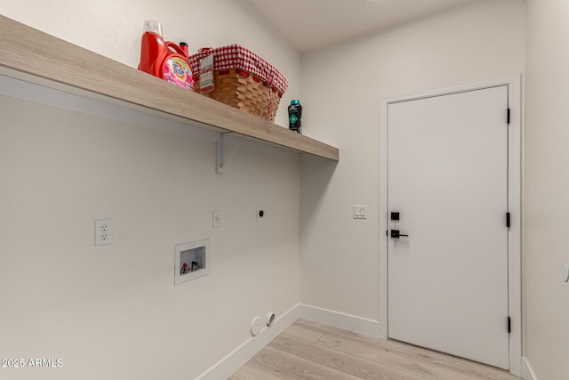 laundry area with electric dryer hookup, hookup for a washing machine, and light hardwood / wood-style floors