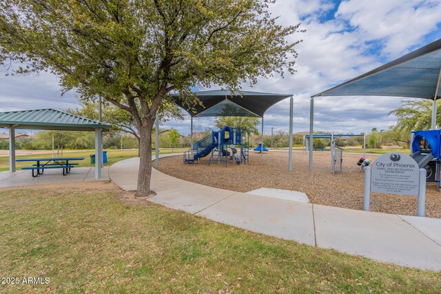 view of playground with a yard