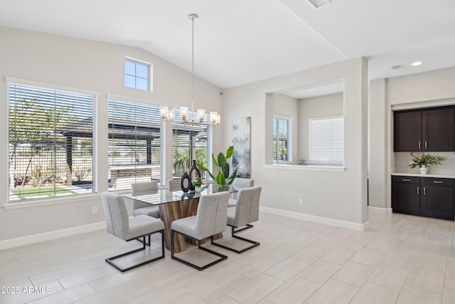 dining space with vaulted ceiling, a notable chandelier, recessed lighting, and baseboards