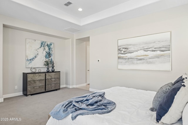 bedroom featuring baseboards, visible vents, carpet floors, recessed lighting, and a raised ceiling