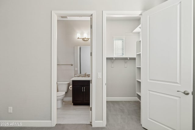 interior space featuring a sink and carpet floors