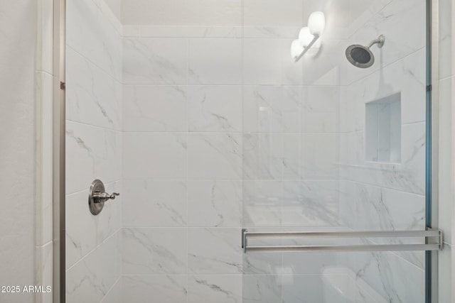 bathroom featuring a stall shower