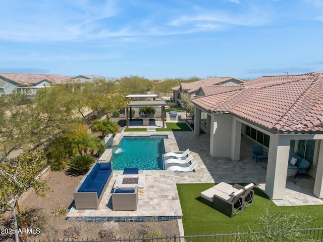 view of pool with a fenced in pool, an outdoor living space with a fire pit, and a patio