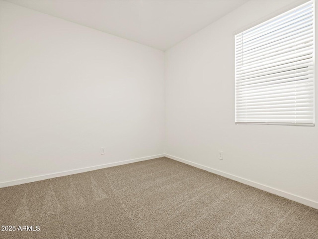 16015 W Desert Hollow Dr, Surprise, AZ 85387 - carpeted spare room featuring baseboards