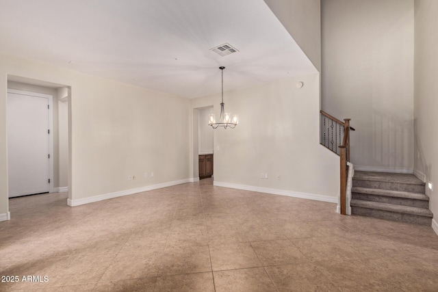 unfurnished living room with stairway, baseboards, visible vents, and a chandelier