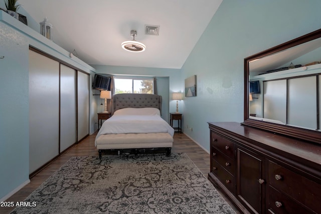 1406 E Jasper Dr, Chandler, AZ 85225 - bedroom featuring vaulted ceiling and wood finished floors