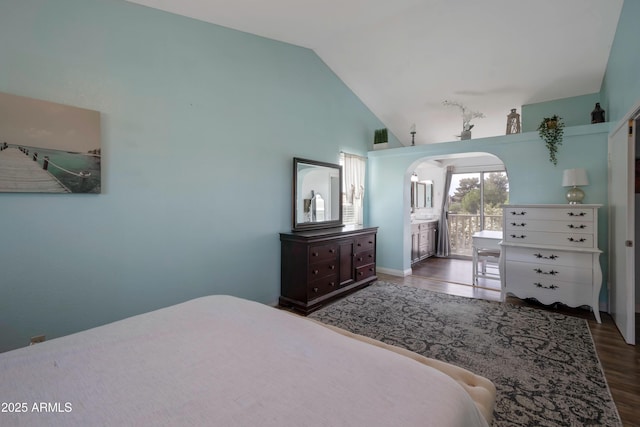 1406 E Jasper Dr, Chandler, AZ 85225 - bedroom with wood finished floors, arched walkways, and high vaulted ceiling