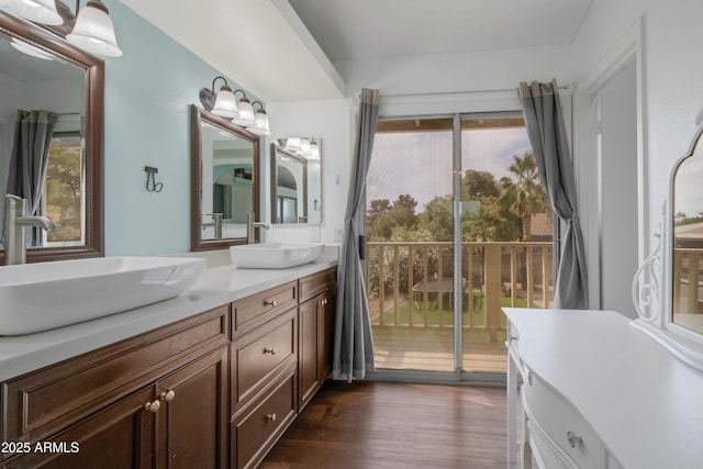 1406 E Jasper Dr, Chandler, AZ 85225 - bathroom with healthy amount of natural light, double vanity, and wood finished floors
