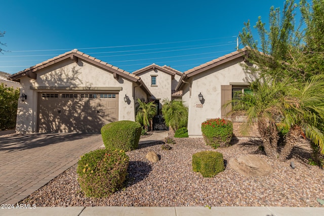 view of front of property featuring a garage