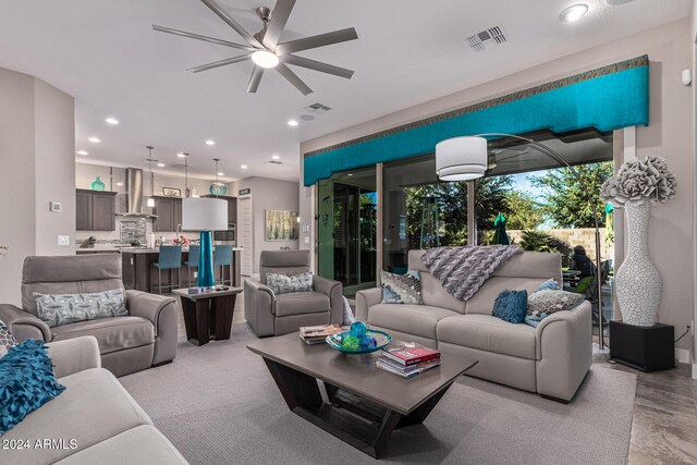 living room featuring ceiling fan