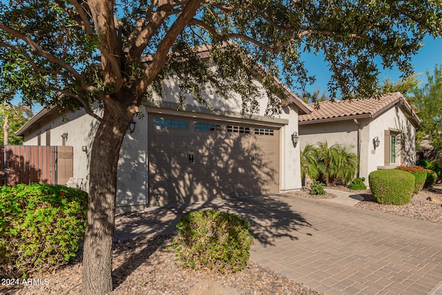 view of front of property with a garage