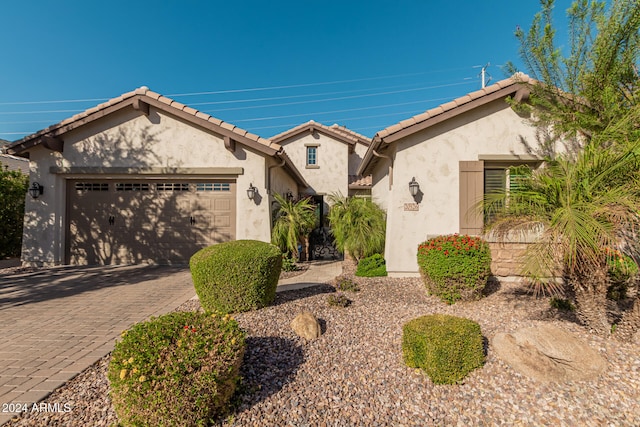 view of front of home featuring a garage