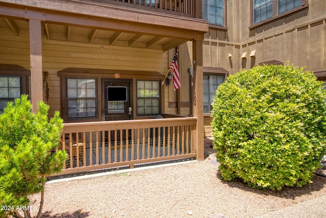 doorway to property with a balcony