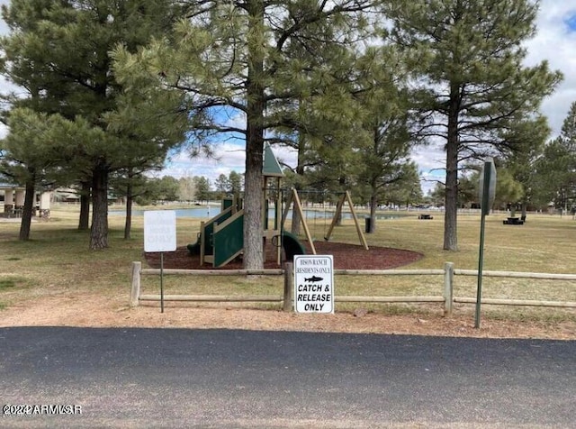 view of front of house featuring a playground