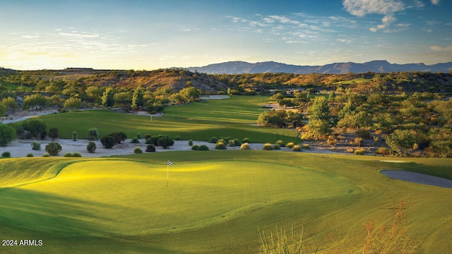 surrounding community with a mountain view