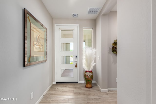 foyer with light wood-type flooring