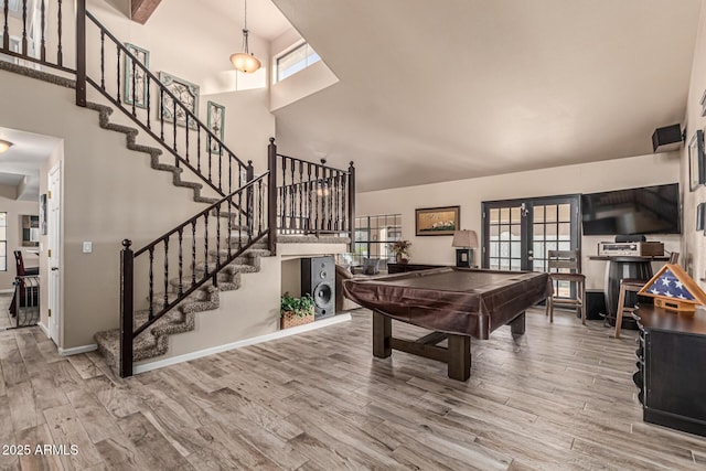 6133 E Saddleback St, Mesa, AZ 85215 - recreation room with a towering ceiling, wood finished floors, french doors, billiards table, and baseboards