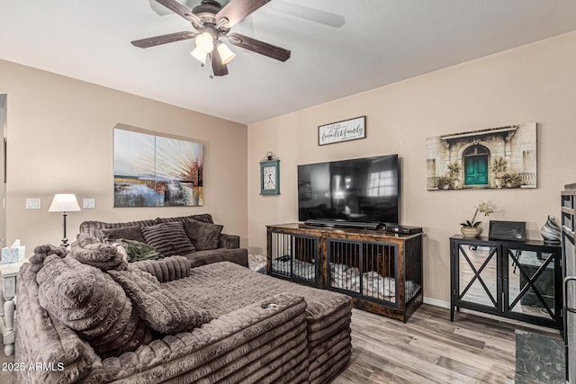 6133 E Saddleback St, Mesa, AZ 85215 - living area featuring a ceiling fan and wood finished floors