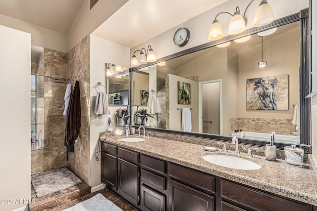 6133 E Saddleback St, Mesa, AZ 85215 - bathroom featuring a walk in shower, double vanity, and a bath