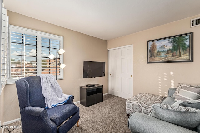 6133 E Saddleback St, Mesa, AZ 85215 - carpeted living room featuring baseboards