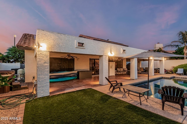 6133 E Saddleback St, Mesa, AZ 85215 - rear view of house with a ceiling fan, a patio area, stucco siding, and a gazebo