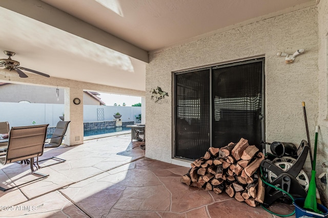 6133 E Saddleback St, Mesa, AZ 85215 - fenced backyard featuring ceiling fan and a patio area