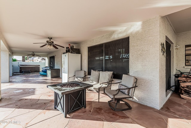 6133 E Saddleback St, Mesa, AZ 85215 - view of patio featuring a fire pit, a hot tub, and ceiling fan