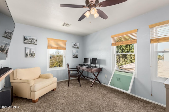 office space with ceiling fan, carpet floors, and a wealth of natural light