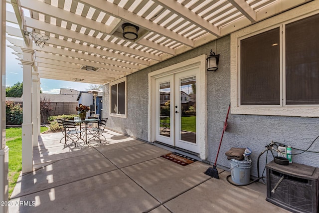 view of patio featuring a pergola and french doors