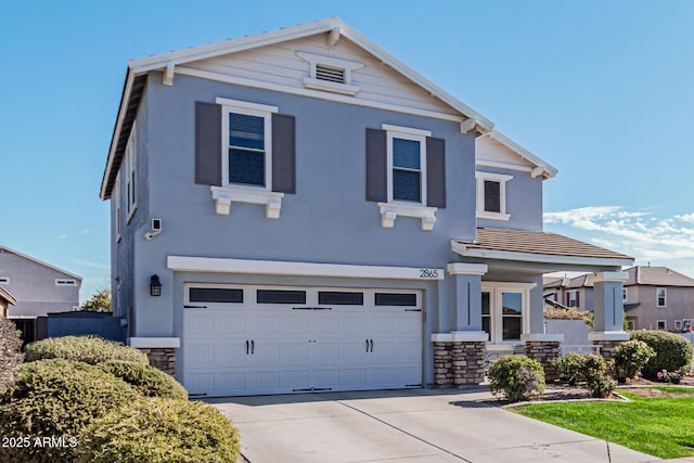 front facade with a garage