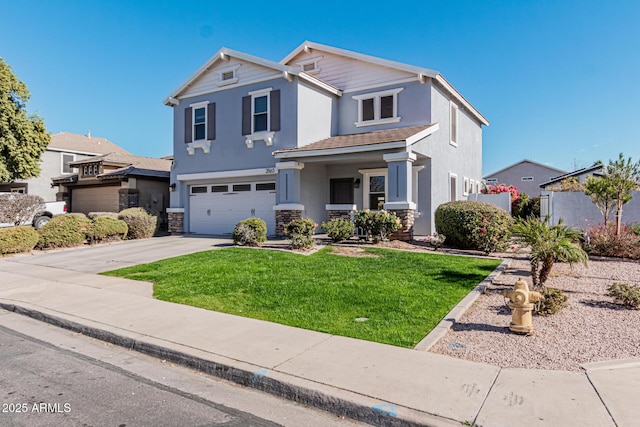 front of property featuring a garage and a front lawn