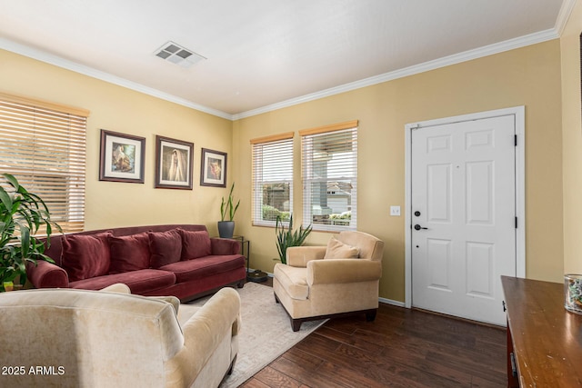 living room featuring dark hardwood / wood-style floors and crown molding