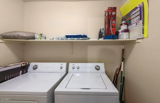 laundry area featuring washing machine and dryer