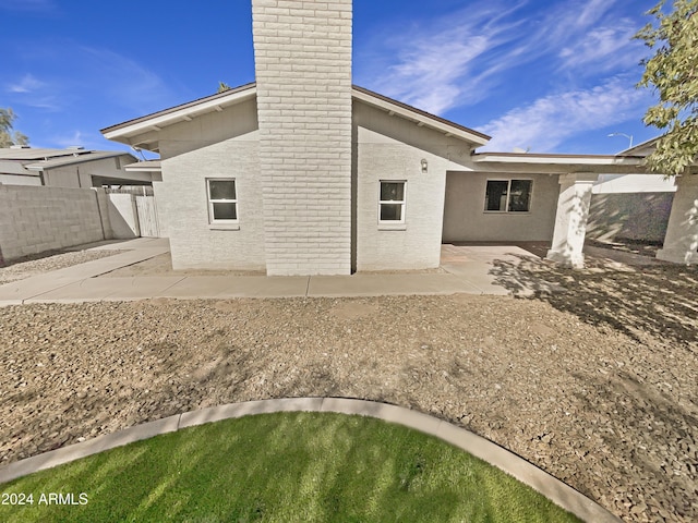 rear view of house with a patio area