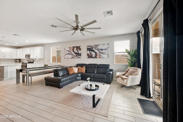 17968 W Hilton Ave, Goodyear, AZ 85338 - living area featuring ceiling fan and recessed lighting