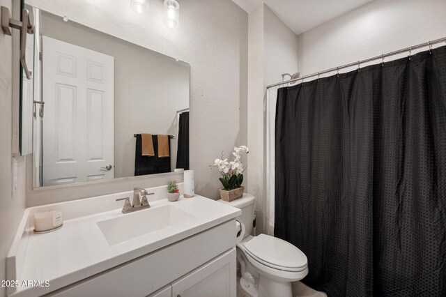 17968 W Hilton Ave, Goodyear, AZ 85338 - full bath featuring toilet, vanity, and a shower with shower curtain