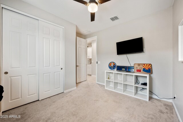 17968 W Hilton Ave, Goodyear, AZ 85338 - carpeted bedroom featuring baseboards, a closet, and ceiling fan