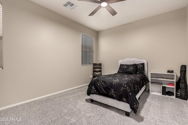 bedroom with ceiling fan and carpet flooring