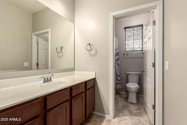 bathroom featuring vanity, walk in shower, tile patterned floors, and toilet