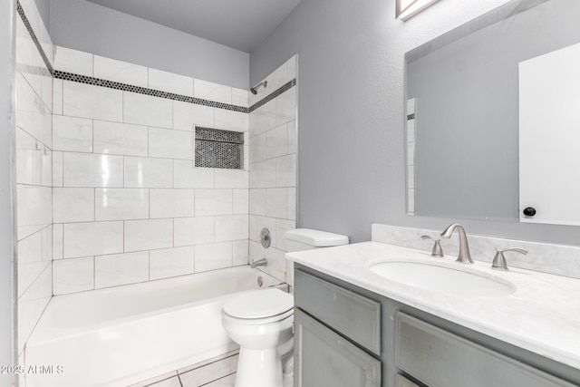 full bathroom with tub / shower combination, vanity, and toilet