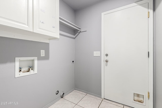 clothes washing area with marble finish floor, hookup for a washing machine, cabinet space, electric dryer hookup, and baseboards