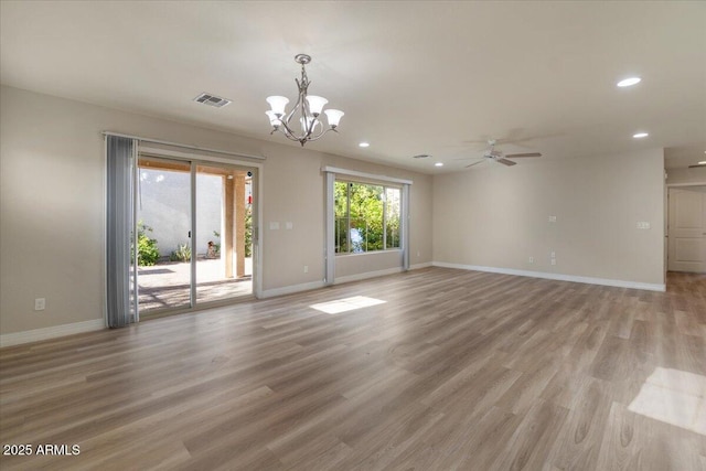 2868 E Binner Dr, Chandler, AZ 85225 - unfurnished living room featuring recessed lighting, baseboards, a chandelier, light wood-style floors, and ceiling fan