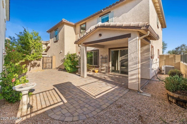 2868 E Binner Dr, Chandler, AZ 85225 - rear view of house with a gate, stucco siding, a patio area, and fence