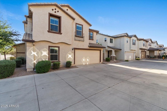 2868 E Binner Dr, Chandler, AZ 85225 - view of front of property with a residential view, an attached garage, stucco siding, a tile roof, and driveway