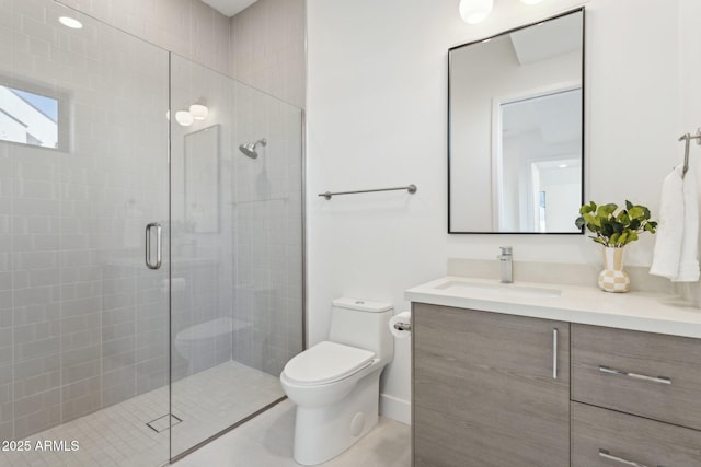 bathroom featuring vanity, toilet, an enclosed shower, and tile patterned flooring